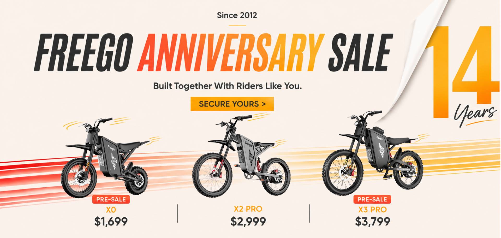 Promotional banner for a Freego Anniversary Sale featuring three electric dirt bikes: the F3 Pro ($3,799), V3 Pro ($2,999), and F2 Pro ($1,699). The image includes a '14 Years' graphic and a 'Secure Yours >' button on a beige background with orange and yellow graphic accents.